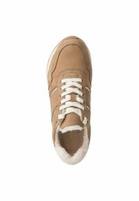 Tan suede sneaker with white laces, plush interior lining, and subtle stitching details. Features a rounded toe and rubber sole.