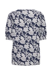 Blouse bleu marine avec motif de vigne florale blanche, manches courtes bouffantes avec poignets élastiques, et encolure ronde vue de dos.