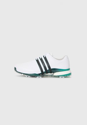 Shoe atlético branco com detalhes em preto e verde, sola de borracha texturizada e três riscas pretas ao longo do lado lateral. Design leve.
