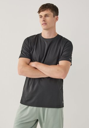 Next, REGULAR FIT-ACTIVE GYM TEXTURED TRAINING - T-shirt basic - black