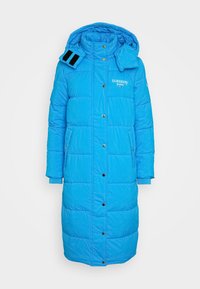 Blå vadderad lång jacka med dragkedja på huvan, tryckknappsstängning, elastiska ärmslut och logotypdetaljer på bröstet och ärmen.