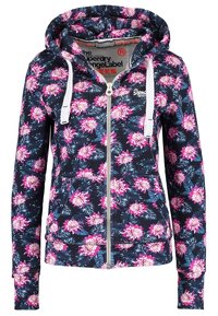 Felpa con zip floreale su sfondo blu navy, con fiori rosa e foglie verdi, coulisse bianche e tasche frontali. Tessuto morbido.