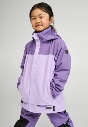 Purple waterproof jacket with a hood, featuring a two-tone design and elastic cuffs. Accents include a logo patch and adjustable hem.