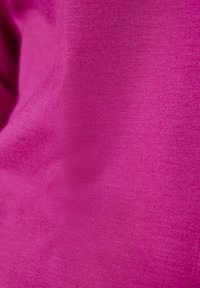 Fuchsia fabric with a smooth, textured finish and fine knit pattern. Material appears stretchy and lightweight, suitable for clothing.