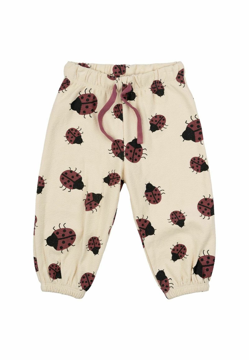 Gyerek nadrág puha bézs szövetből, piros és fekete katicabogár mintával. Rugalmas derékrésszel és ráncolt mandzsettákkal rendelkezik.