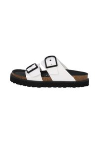 White slide sandal with two adjustable black buckles, textured cork footbed, and thick black rubber sole. Simple design, open toe.