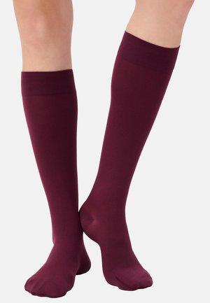 Bordeaux knielange sokken van soepel materiaal, met een geribbelde bovenband en een naadloze teen voor comfort.
