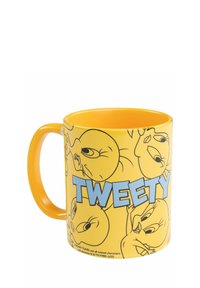 Tazza di ceramica gialla con il personaggio dei cartoni animati Tweety, caratterizzata da grafiche ripetute, grande manico e finitura lucida e liscia.