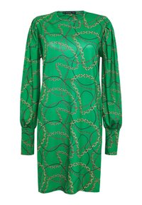 Vihreä mekko sileästä kankaasta, jossa on kultaketjukuosi, pitkät hihat ja pyöreä pääntie, hieman löysä istuvuus.