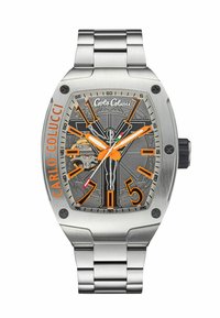 Stainless steel watch with gray dial, orange accents, and large hour markers. Features a transparent case back showing movement.