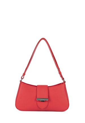 Red leather handbag with a curved shape, adjustable shoulder strap, and a front flap closure featuring a metallic accent.