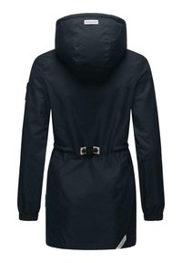Navy blue waterproof jacket with a cinched waist, large hood, and elastic cuffs. Features silver drawstring hardware and side pockets.