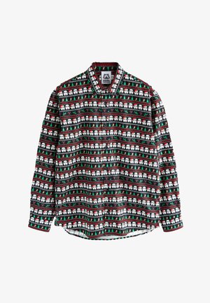 Svart långärmad skjorta med ett upprepat mönster av vita figurer med tomteluva, gröna träd, polkagrisar och röda detaljer.