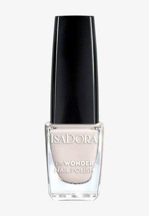 IsaDora The Wonder Nagellack in einem durchsichtigen beigen Farbton, verpackt in einer klaren Glasflasche mit einem eleganten schwarzen Verschluss.