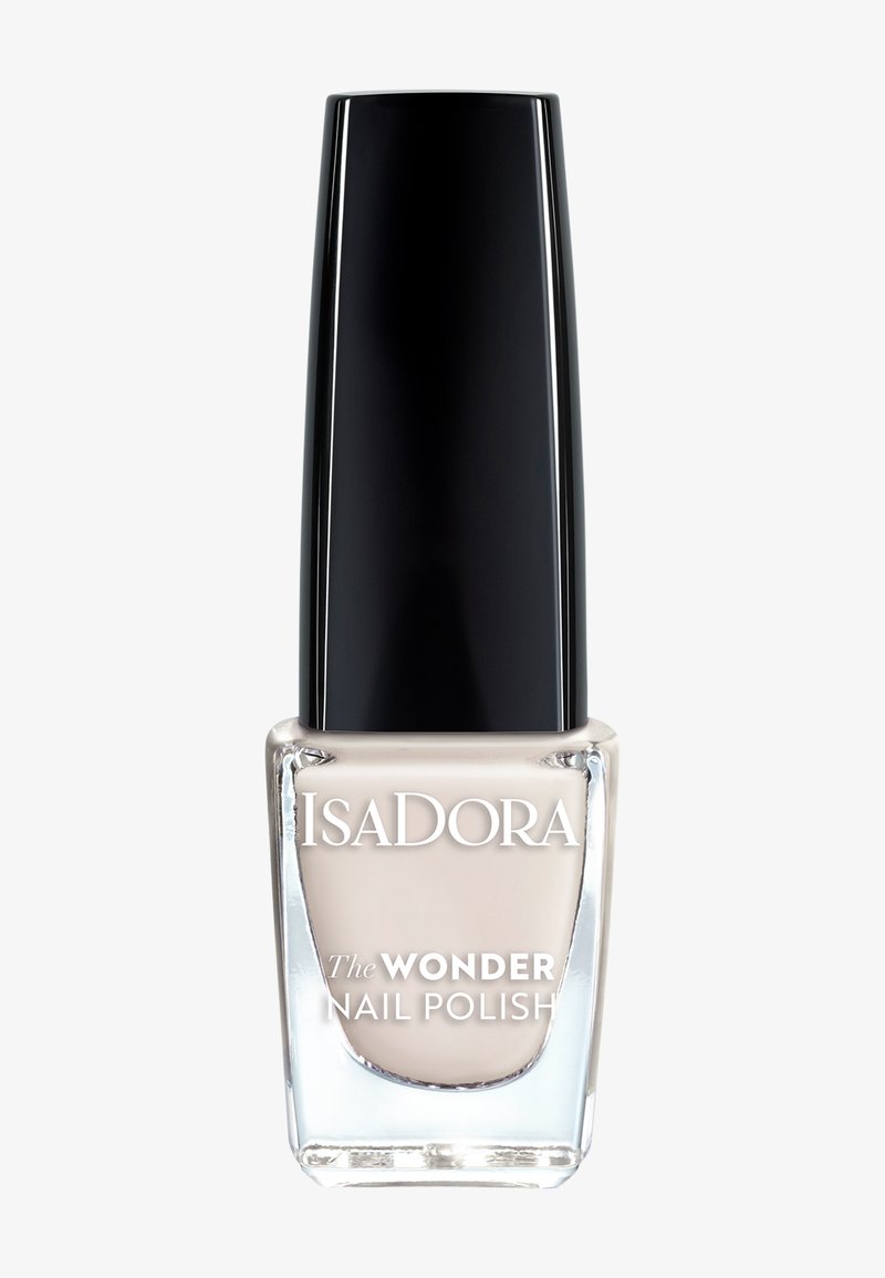 Lakier do paznokci IsaDora The Wonder w przezroczystym beżowym odcieniu, w przezroczystej szklanej butelce z eleganckim czarnym korkiem.