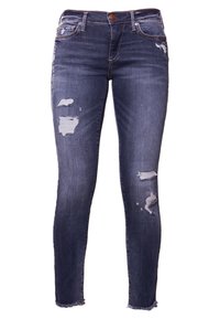 Hubené džíny v tmavém denimu, zdobené distressed detaily s několika trhlinami, zapínání na knoflík a třepené manžety.