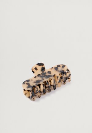 Acetate hair clip with a tortoiseshell pattern, featuring a contoured design and multiple gripping teeth for secure hold.