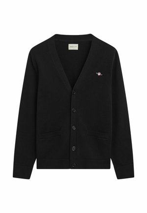 Cardigan nero realizzato in tessuto morbido, con scollo a V, chiusura a bottoni, due tasche frontali e un piccolo logo in alto a sinistra.