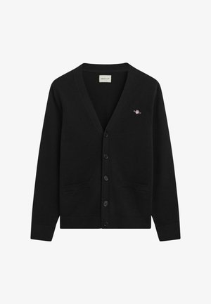 Cardigan nero realizzato in tessuto morbido, con scollo a V, chiusura a bottoni, due tasche frontali e un piccolo logo in alto a sinistra.