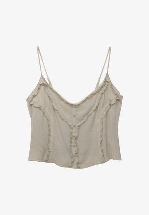 Beige toppi ilman hihoja ohuilla olkaimilla, jossa on röyhelöreunus kauluksessa ja edessä sekä pieniä nappeja. Rakeinen kangas.