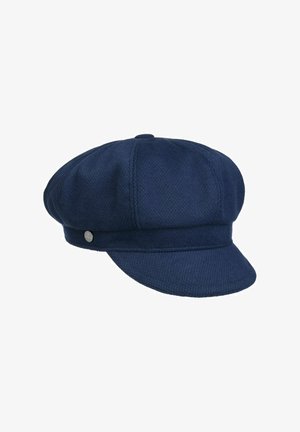 Navy blue textured fabric newsboy cap with a short, stiff brim and a small round button on the side.