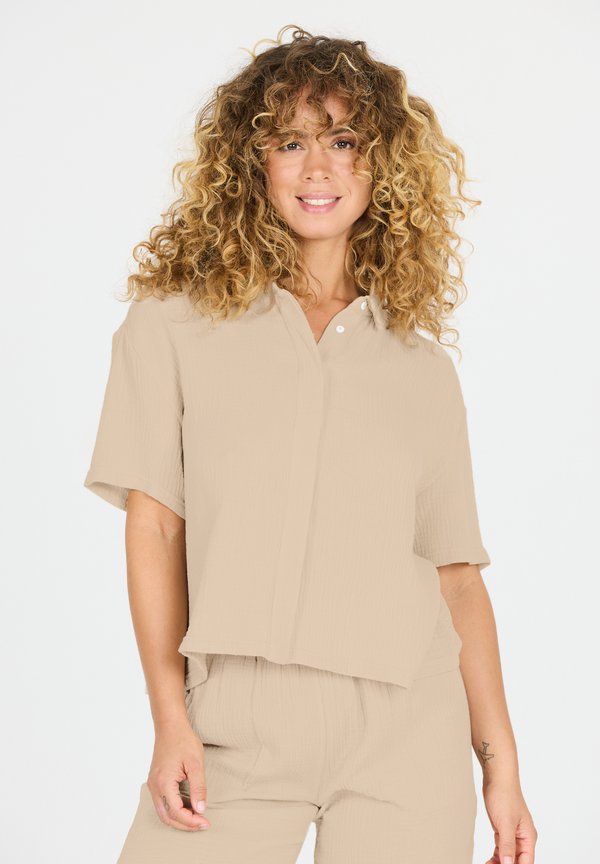 Hemdbluse - island fossil