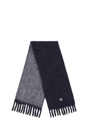Bufanda de punto con un degradado de gris oscuro a gris claro, con flecos en los extremos y un pequeño logo redondo en un lado. Tejido suave y texturizado.