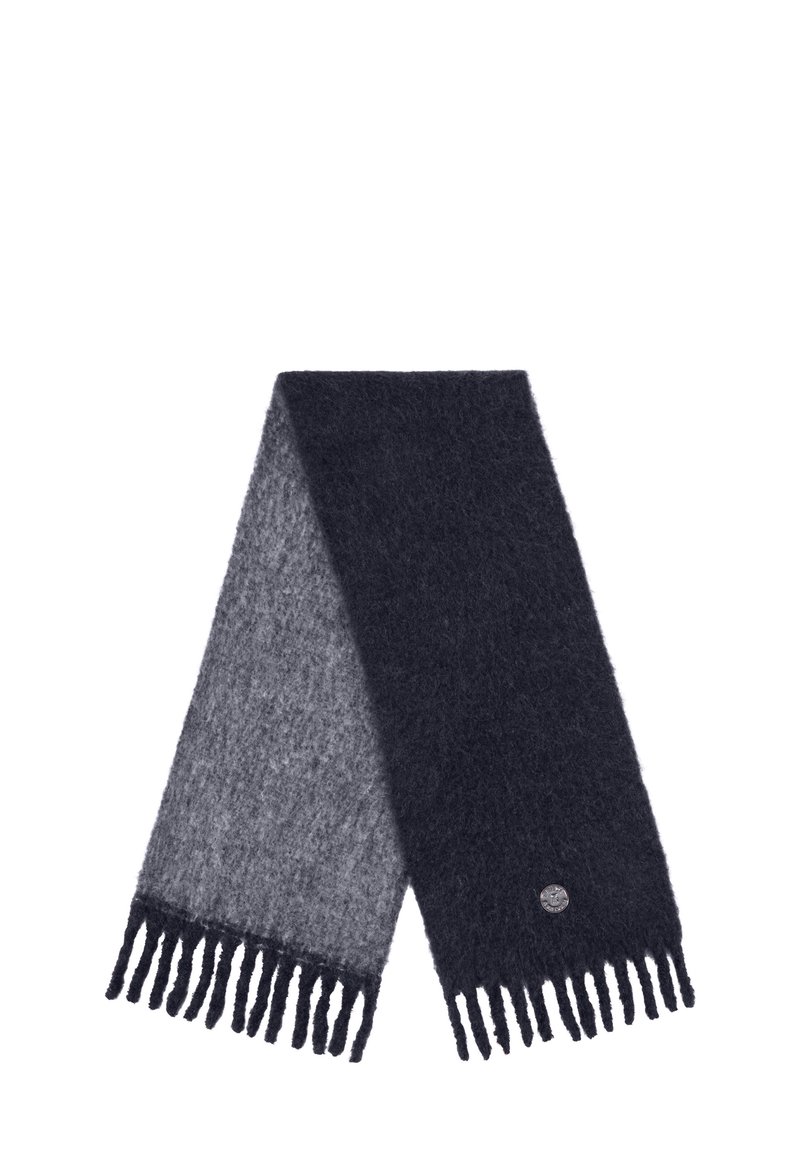 Bufanda de punto con un degradado de gris oscuro a gris claro, con flecos en los extremos y un pequeño logo redondo en un lado. Tejido suave y texturizado.