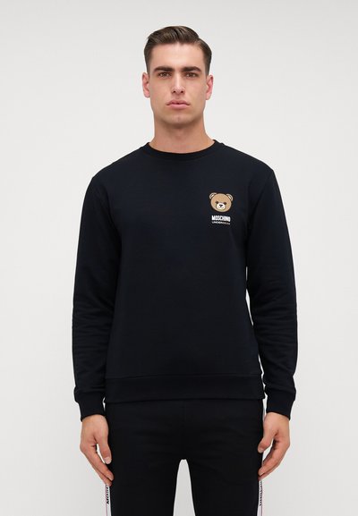Black sweatshirt in cotton blend, featuring a bear graphic and brand text on the chest; round neckline and ribbed cuffs and hem.