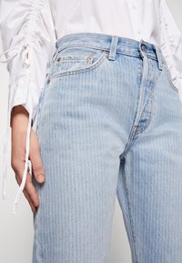 Levi's® Těhotenské džíny - bleached denim