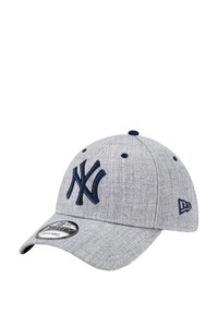 Gray cap made of textured fabric featuring a navy blue embroidered "NY" logo on the front and a curved brim. Adjustable strap at the back.
