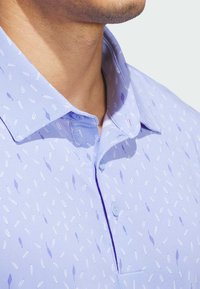 adidas Performance ULTIMATE365 ALLOVER PRINT - Polo shirt - blue spark