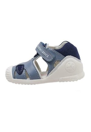 Sandalo per bambini in pelle e suede blu con suola in gomma bianca, cinturino regolabile, aperture e design cucito.
