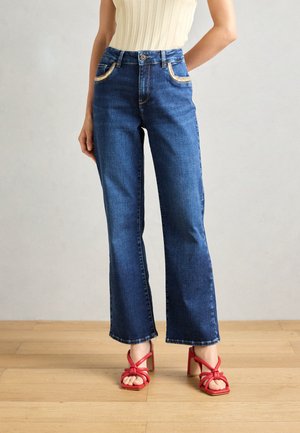 PERLA - Flared Jeans - dark blue