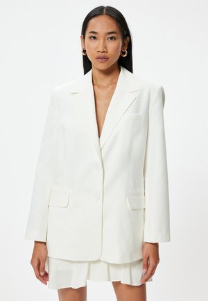 Halflange jas - white