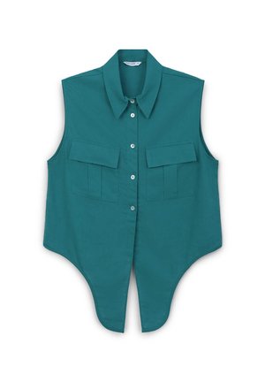 Teal sleeveless shirt with a pointed collar, two front patch pockets, and a curved hem. Made of a smooth fabric and features button closures.