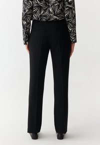 TATUUM LAURANIA - Kalhoty - black