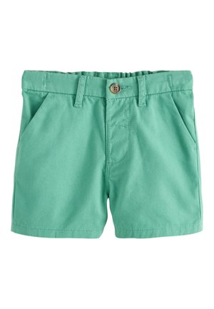 Zielone bawełniane spodenki dla dzieci z przednimi kieszeniami, szlufkami na pasek oraz pojedynczym brązowym guzikiem do zapięcia.