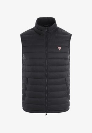 Chaleco acolchado negro con cuello alto, cierre de cremallera y dos bolsillos laterales. Presenta costuras horizontales y un pequeño logo en el pecho.