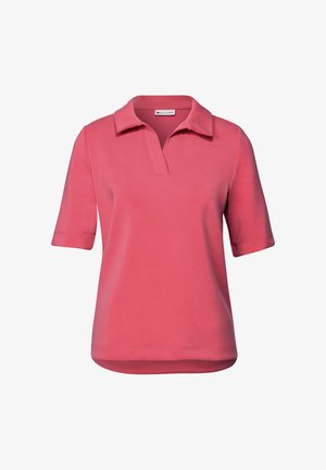 Kortärmad pikétröja i korall, tillverkad av mjuk bomull, med krage och delvis knappslå. Slät textur och avslappnad design.