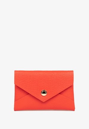 Orange textured leather envelope wallet with a snap closure and a gold circular logo accent. Slim design with a triangular flap.