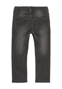 Jeans gris foncé avec une taille douce et élastique, deux poches arrière, jambes droites et une texture décolorée pour un aspect usé.