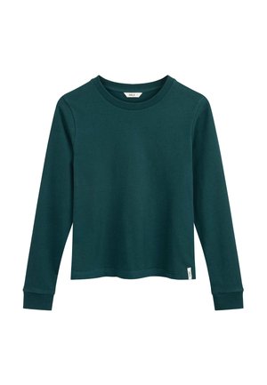T-shirt à manches longues vert foncé avec col rond, poignets et une petite étiquette blanche sur l'ourlet inférieur, présenté sur un fond blanc.