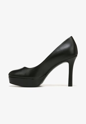 Black leather high-heeled platform pump with a rounded toe and sleek design. The heel is slender and tall, contrasting with the broader platform.