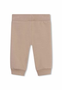 Beige katoenen blend pantalons met een geribde tailleband en mouwen, met een gladde textuur en eenvoudig ontwerp. Geschikt voor casual gebruik.