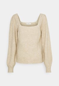 Top in maglia a coste di un beige chiaro, con maniche lunghe a sbuffo e scollatura quadrata. Presenta una forma aderente e un tessuto testurizzato.