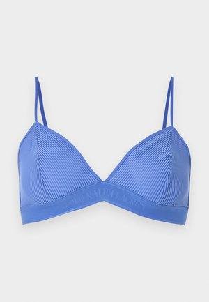 Blå ribbet soft-cup bh med tynde justerbare stropper og et mærket elastikbånd langs bunden.