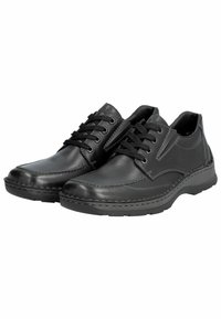 Chaussures en cuir noir avec une finition lisse, design à lacets, coutures contrastées et une semelle en caoutchouc robuste, avec une forme de bout arrondi.