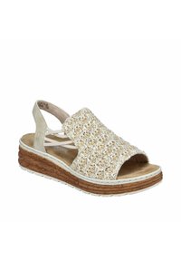 Beige woven sandal with a textured upper, open toe, and cushioned footbed, featuring a cork-like midsole and elastic straps for support.