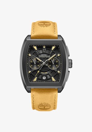 Orologio da polso Timberland con quadrante quadrato nero, subquadranti per doppio fuso orario, finestra della data alle ore 6 e cinturino in pelle marrone chiaro con logo Timberland impresso.